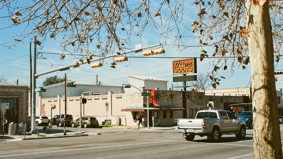 Street view of Allan's Boots store in downtown Austin, Texas during a fall day.