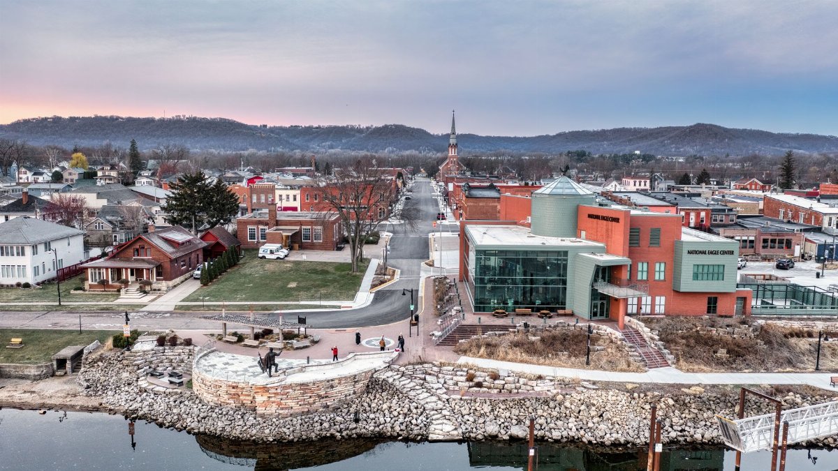 Discover the charming winter landscape of Wabasha, Minnesota, showcasing the National Eagle Center and townscape.