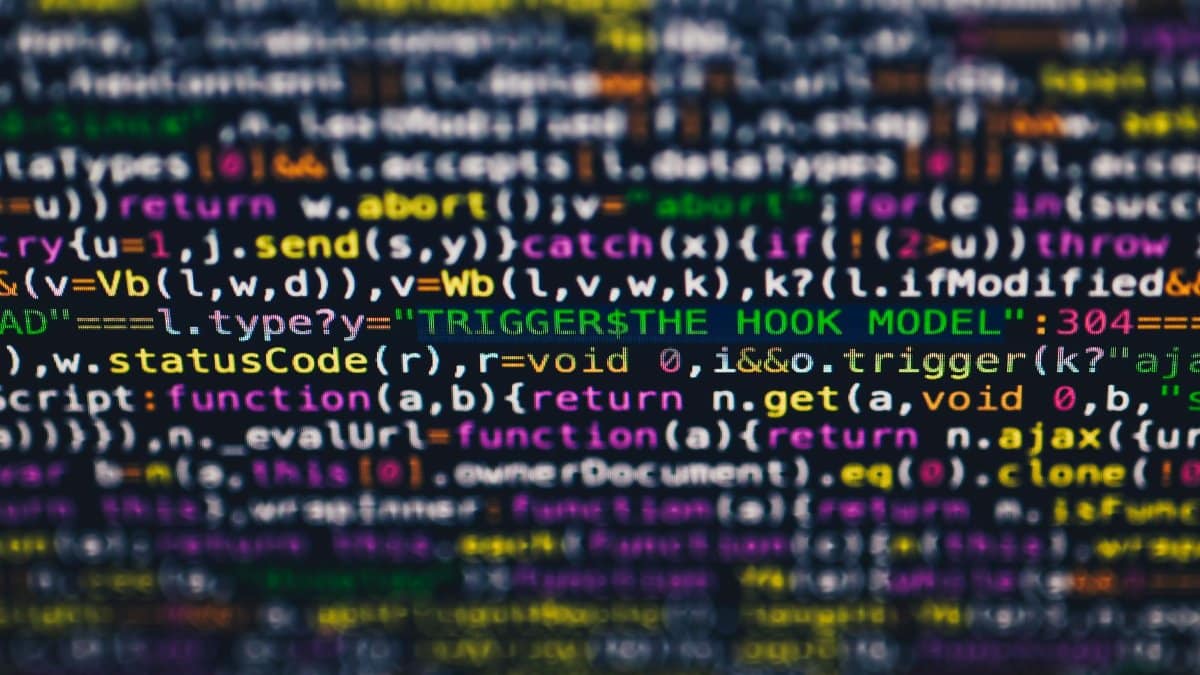 Vibrant close-up of multicolor programming code lines displayed on a screen.