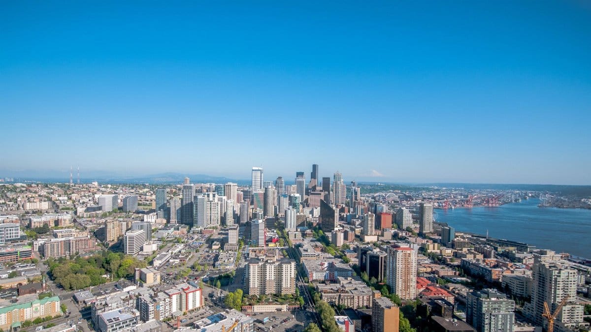Beautiful aerial view of Seattle's skyline with clear blue skies.