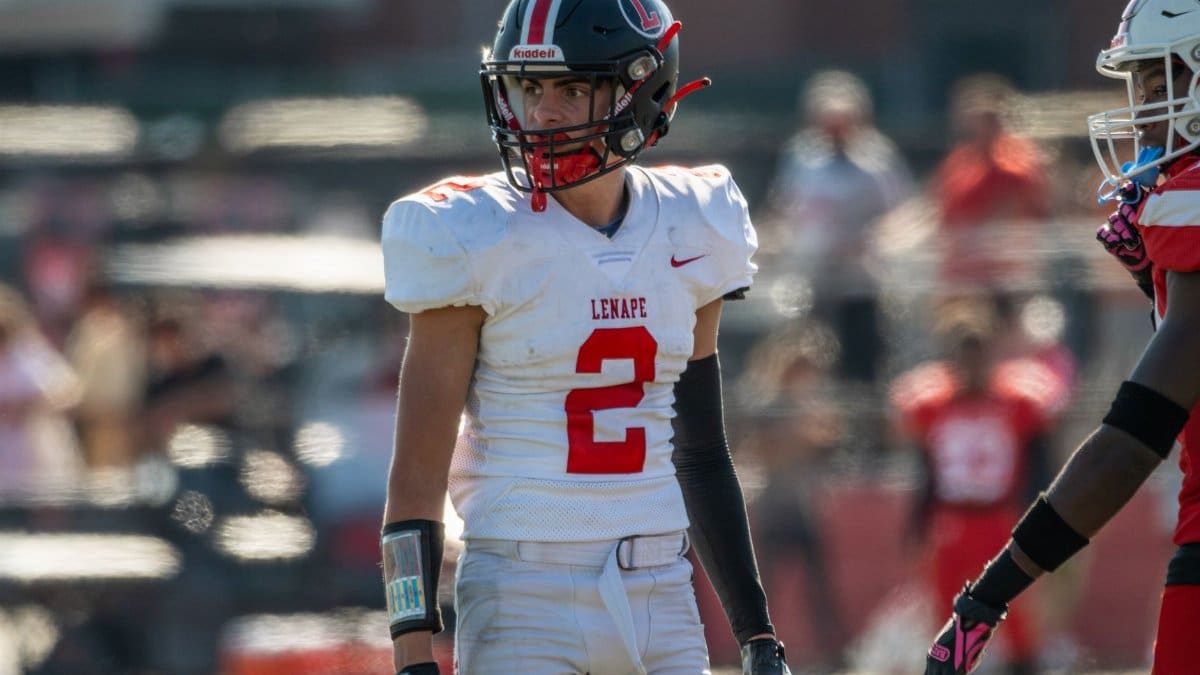 Dynamic portrait of an American football player in action during a game, showcasing athletic spirit.