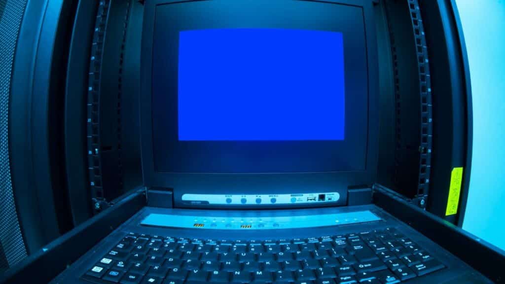 Close-up of a blue screen error shown on a data center control terminal.