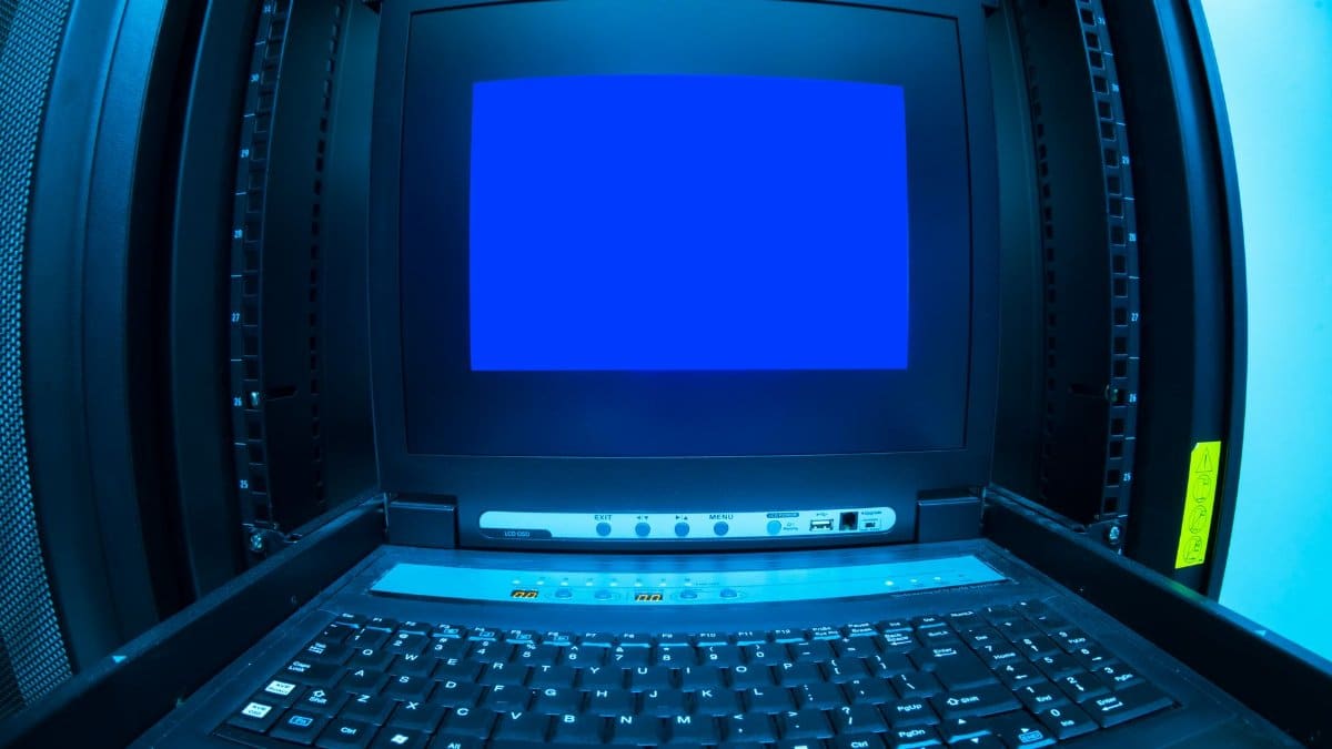 Close-up of a blue screen error shown on a data center control terminal.
