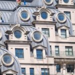 Close-up of a modern building with distinctive circular windows in Washington DC.