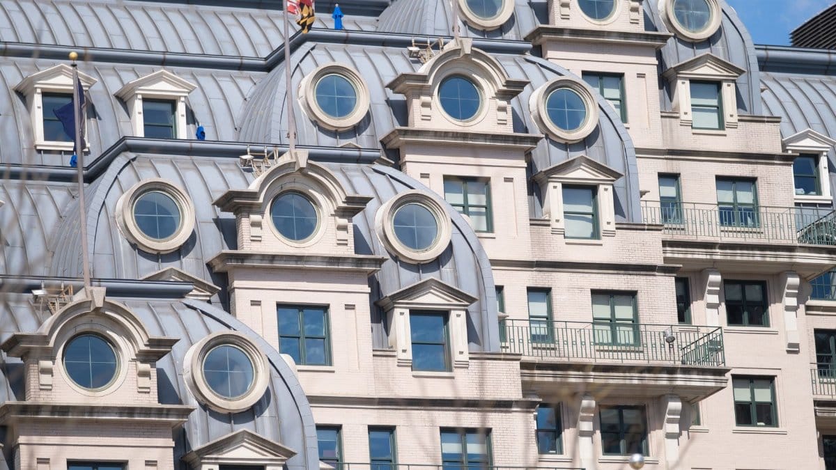 Close-up of a modern building with distinctive circular windows in Washington DC.