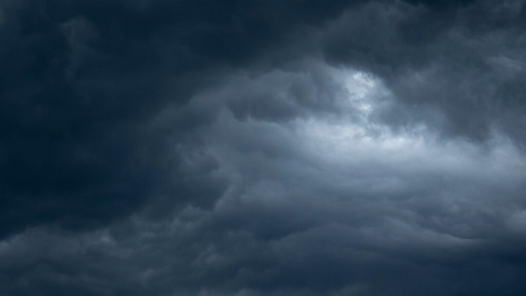 A moody, dark cloud formation creating a dramatic sky scene.