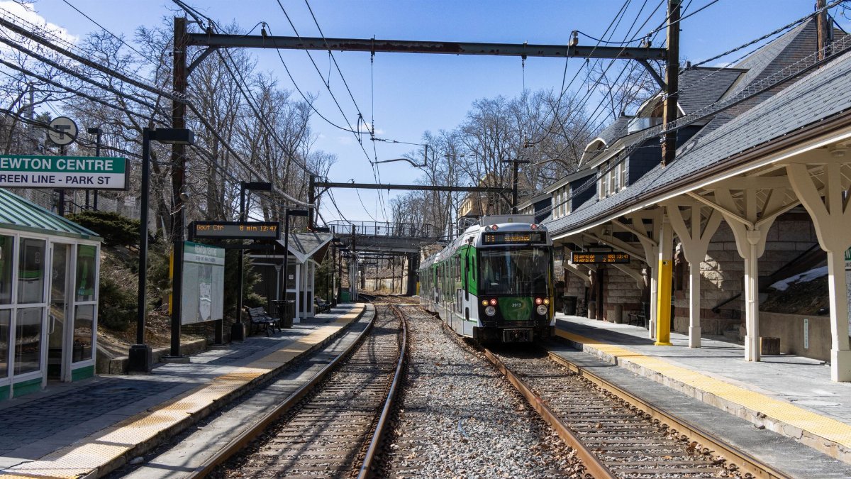 Explore the bustling Newton Centre train station on the Green Line in Massachusetts, USA.