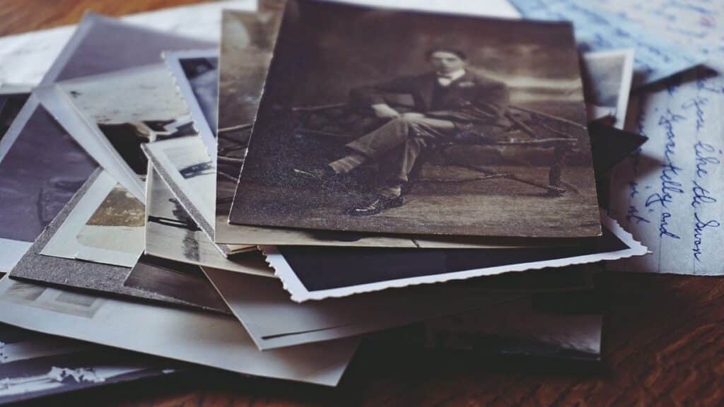 A nostalgic collection of vintage photos and handwritten letters, depicting memories and stories from the past.