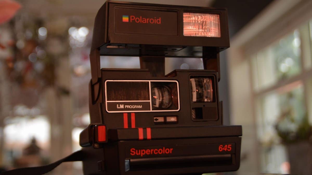 Retro Polaroid camera with vintage design, perfect for analog photography enthusiasts.