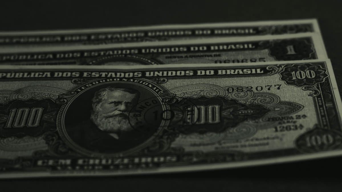 Close-up photo of vintage Brazilian banknotes showcasing historical currency design.