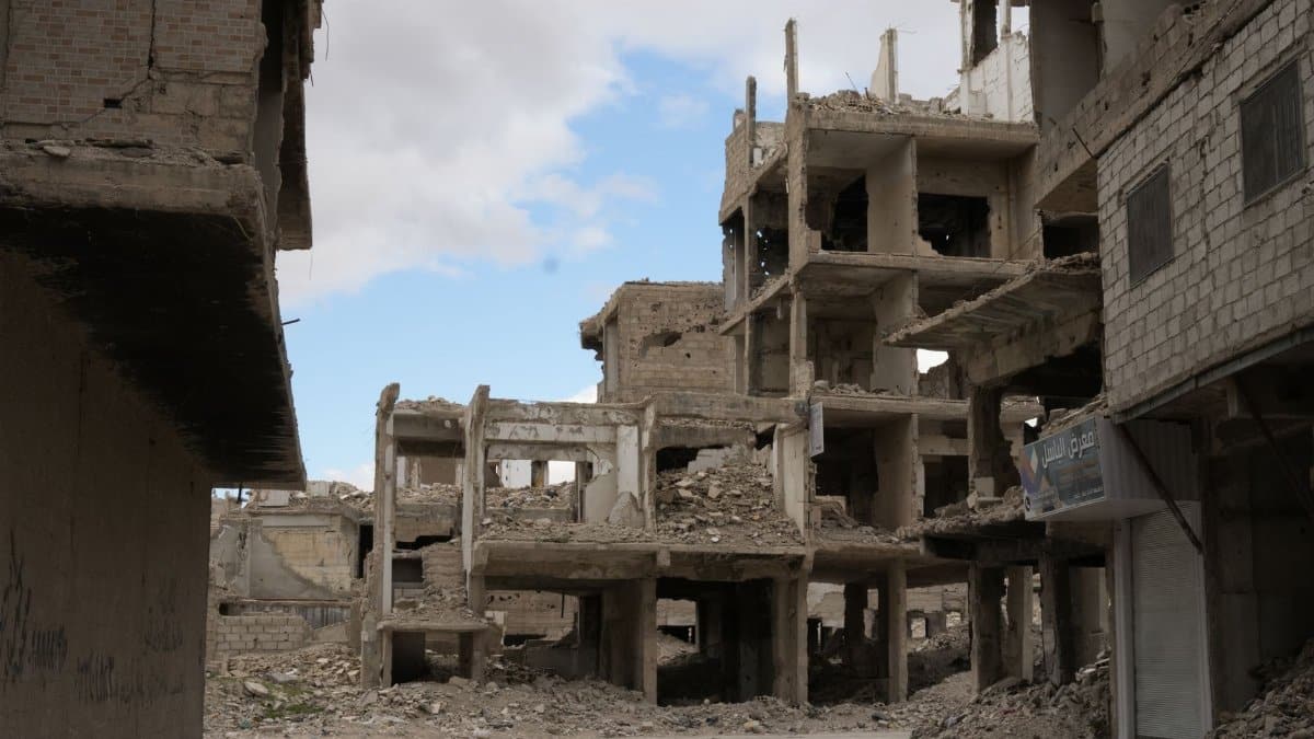 A haunting view of abandoned and destroyed buildings in Damascus, reflecting the impact of conflict.