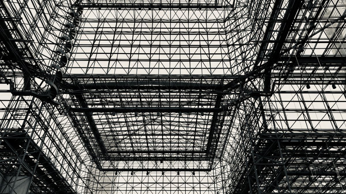 Intricate structural framework of a modern building in New York City, showcasing architectural design.