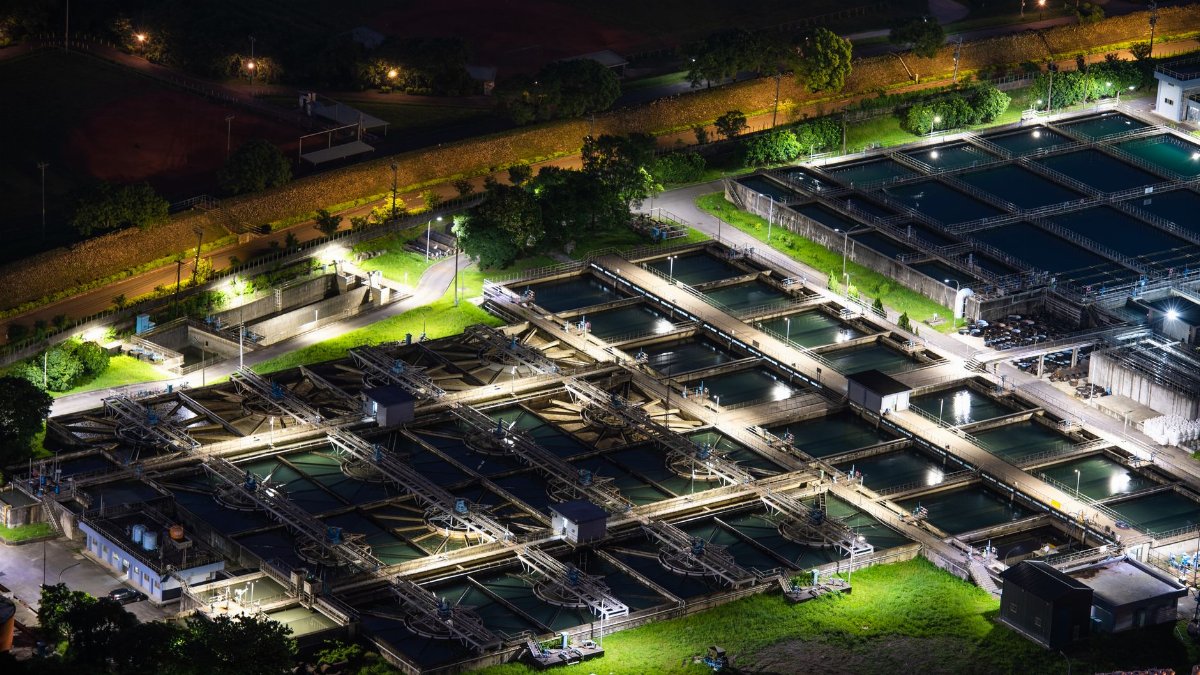 An aerial night view of a lit water treatment facility in Sanxia, Taiwan.