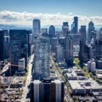 Captivating aerial view of the Seattle skyline, showcasing iconic skyscrapers and urban landscape.