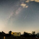 A breathtaking view of a meteor shower and starry night sky in Ohrid, North Macedonia.