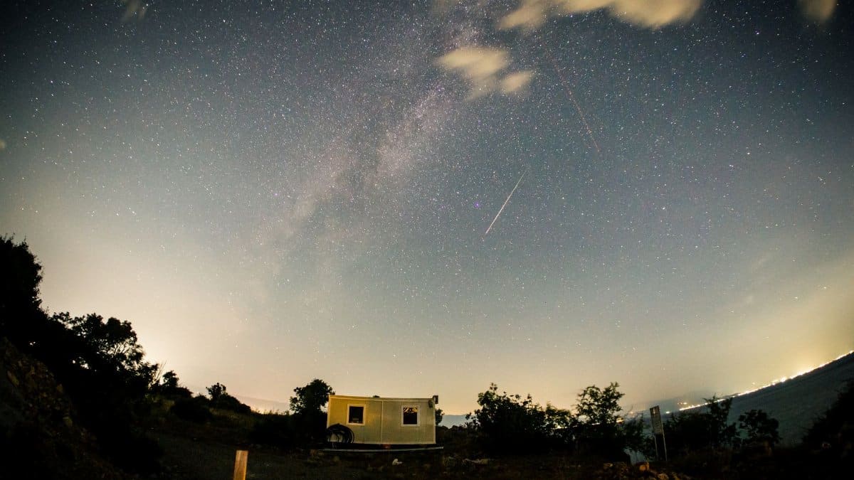 A breathtaking view of a meteor shower and starry night sky in Ohrid, North Macedonia.