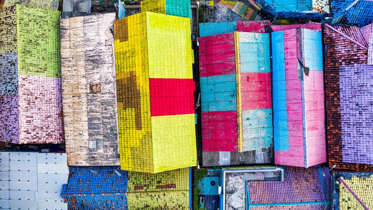 A colorful aerial view of textured rooftops in Banten, Indonesia.