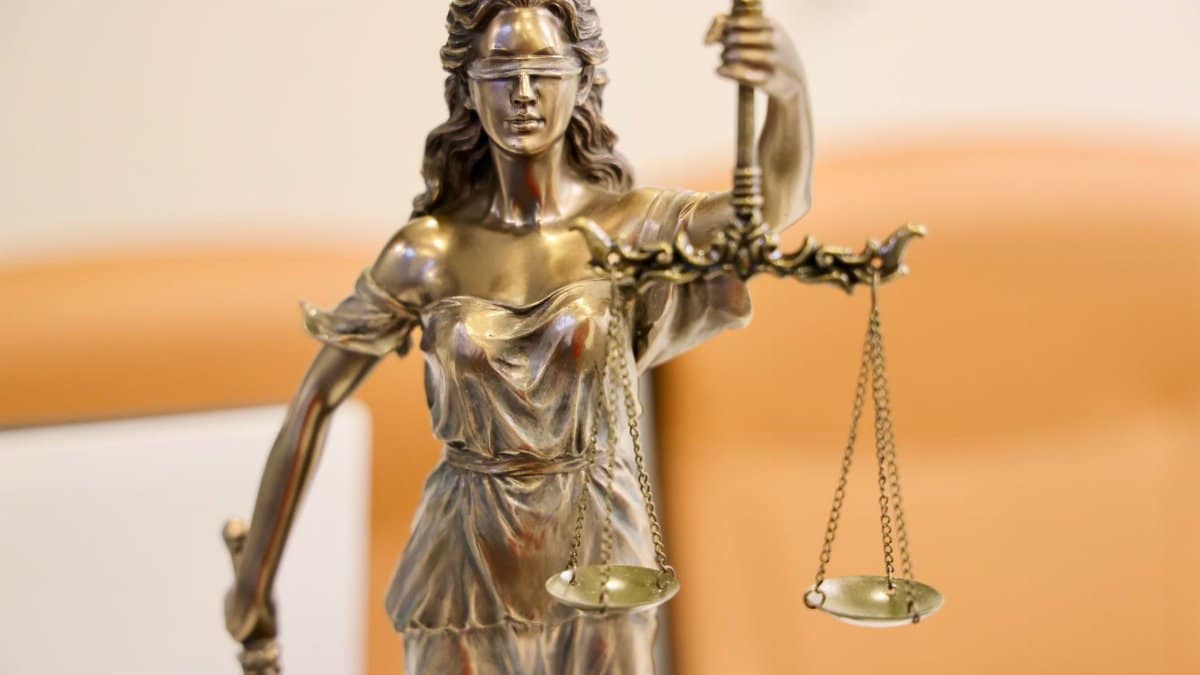 Detailed image of Lady Justice statue, symbolizing fairness and impartiality.