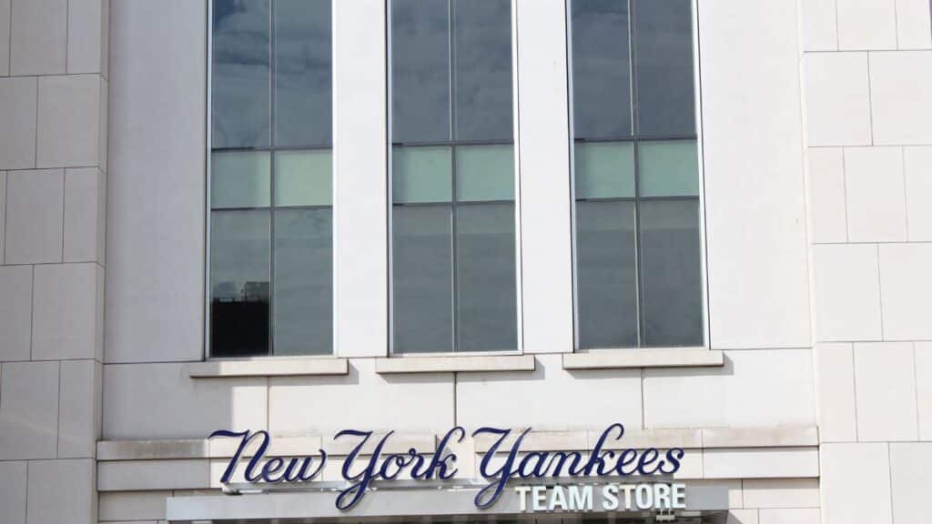 Close-up of the New York Yankees Team Store facade, featuring modern architecture.