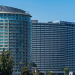 Contemporary architecture in Oakland's skyline on a clear day.