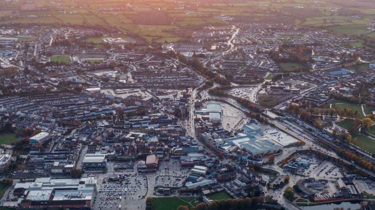 Stunning aerial view showcasing a bustling cityscape at sunset.