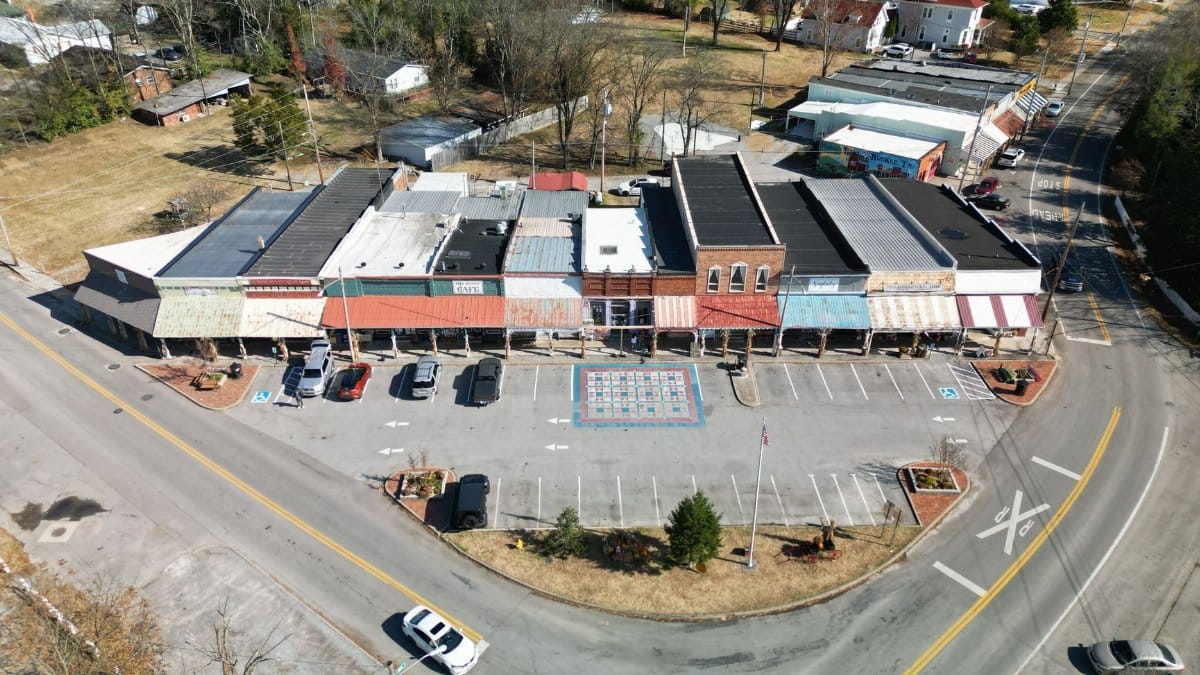 Explore charming downtown Bell Buckle with vintage shops and quiet streets from above.