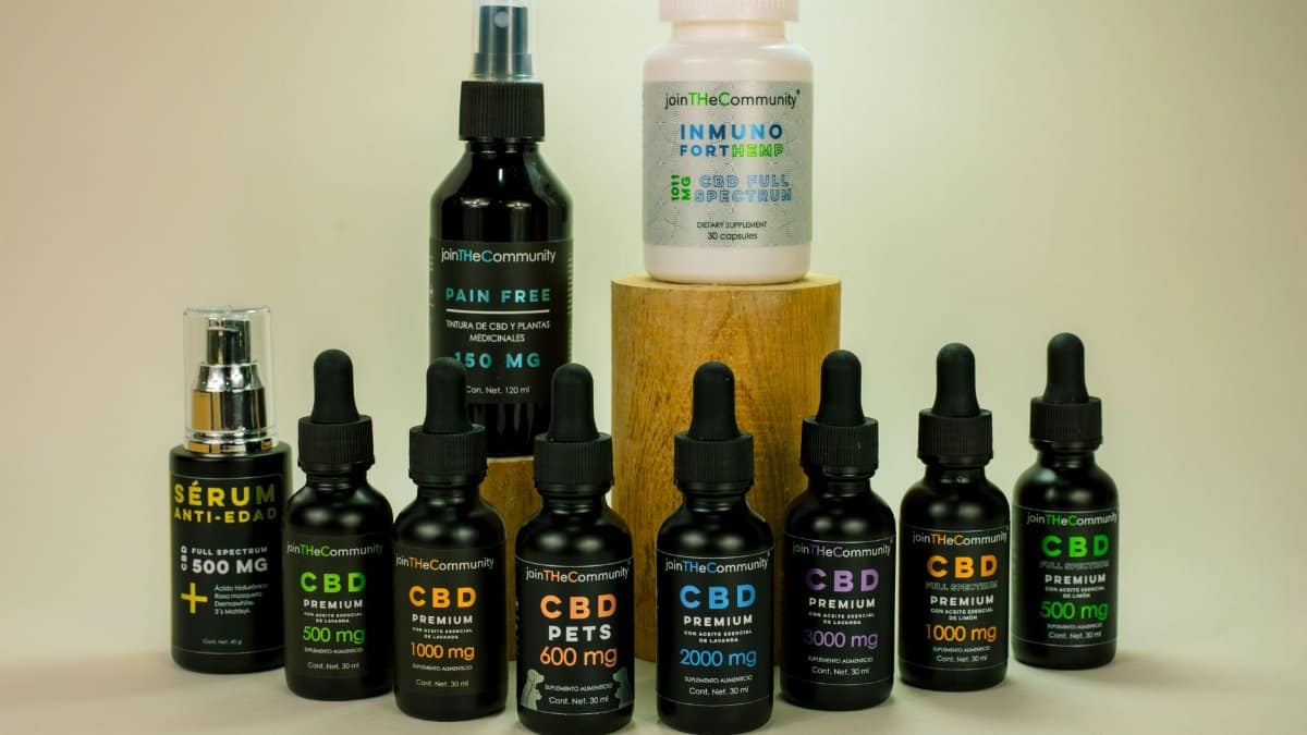 Various CBD products including serums and capsules on a white background, ideal for wellness and health.