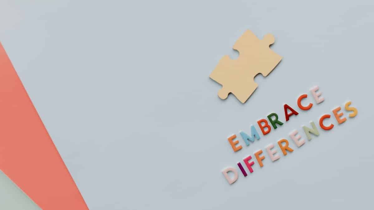 Colorful letters and puzzle piece promoting diversity and inclusion.