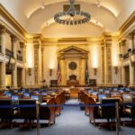 A grand government chamber with elegant columns and seating. Perfect for politics or architecture themes.
