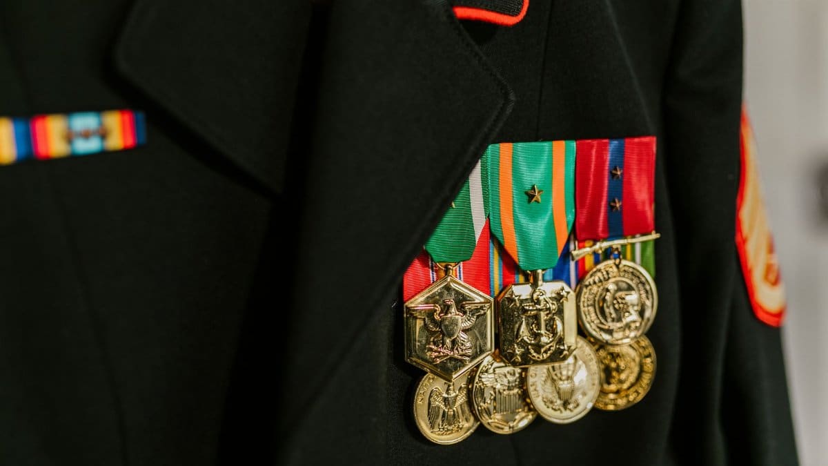 Close-up of a military uniform with vibrant medals representing honor and recognition.