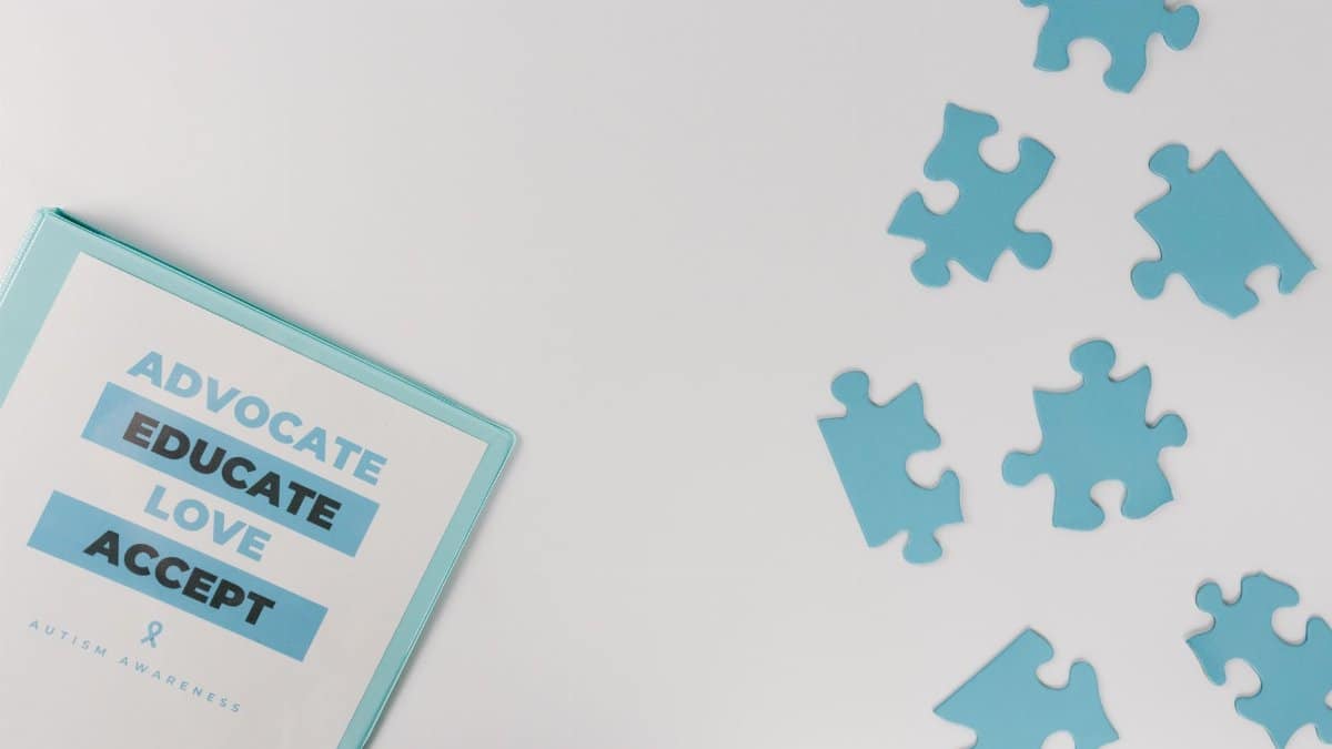 Blue puzzle pieces with advocacy messages for autism awareness.