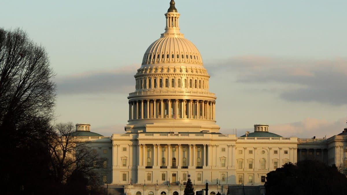 View of the US Capitol Building in Washington D.C. during sunset, highlighting its iconic architecture.