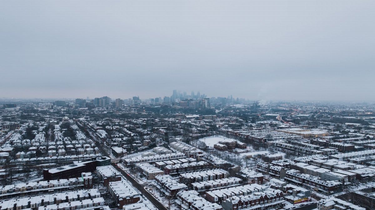 A scenic bird's-eye view of snowy Philadelphia, capturing the urban landscape in winter.