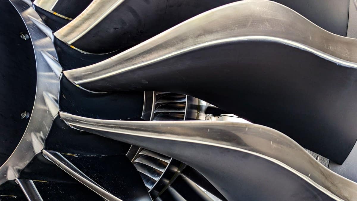Detailed close-up of metal turbine blades showcasing engineering and aerodynamic design.