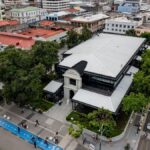 Aerial shot of the vibrant historic center in San Salvador, featuring Plaza Libertad.