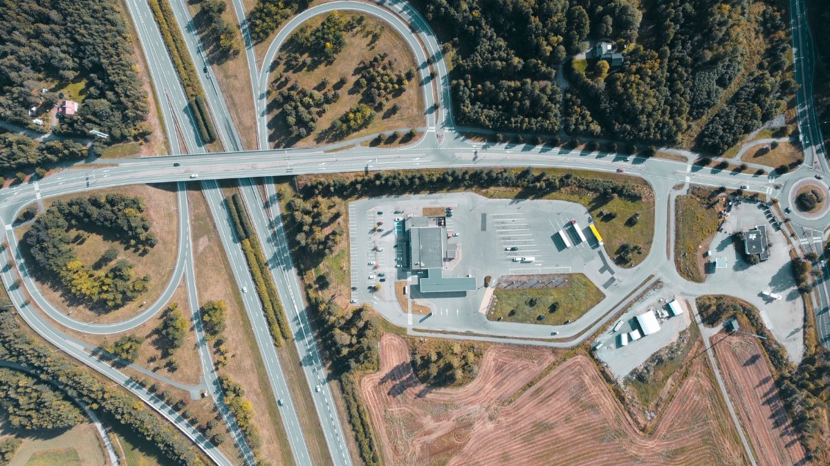 Aerial view of a highway intersection and countryside near Iittala, Suomi.
