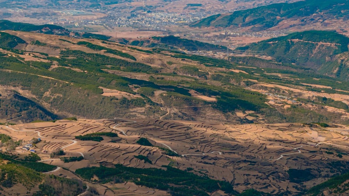 Stunning aerial view of terraced rice fields in Liangshan Yi Autonomous Prefecture, Sichuan, China.