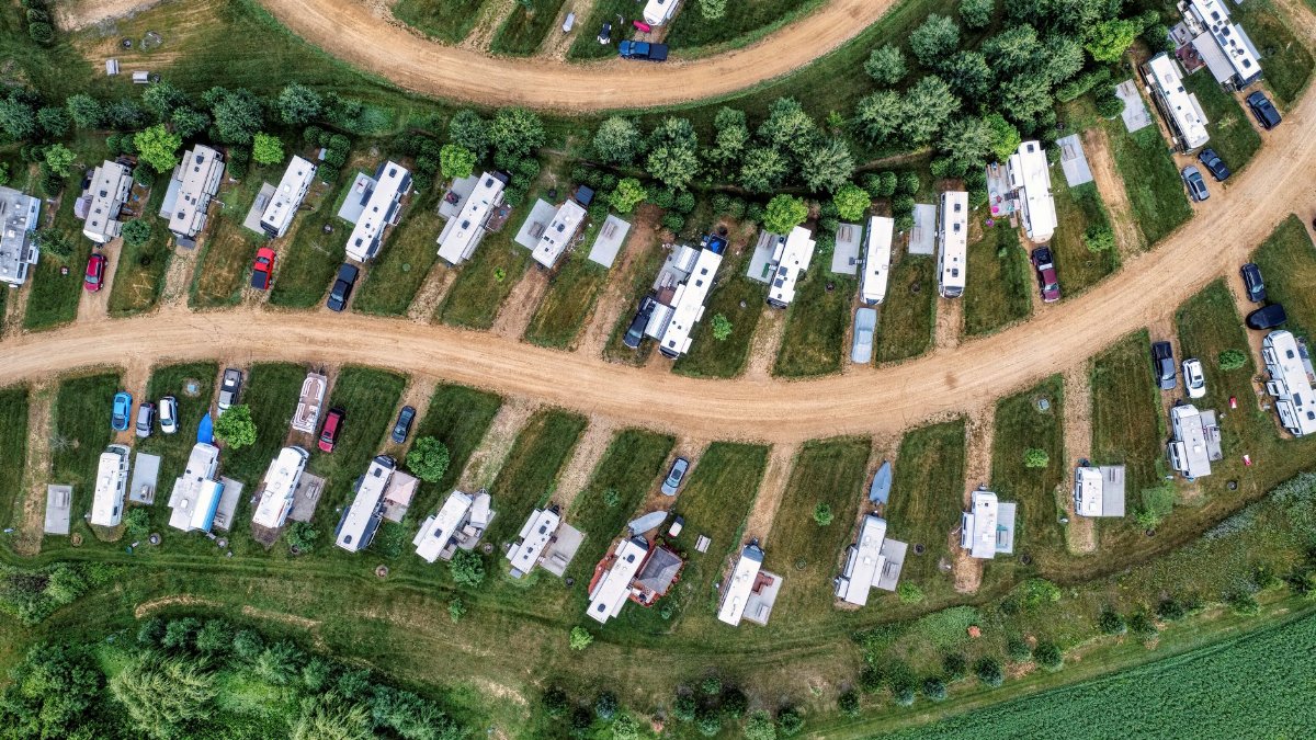 Aerial shot of motorhomes parked in a scenic campground in Nelson, Wisconsin.