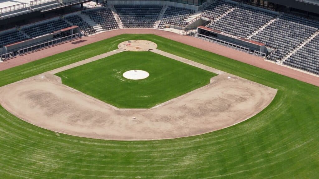 Aerial view of an empty baseball stadium in Chattanooga, Tennessee, showcasing the infield and seating.