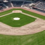 Aerial view of an empty baseball stadium in Chattanooga, Tennessee, showcasing the infield and seating.