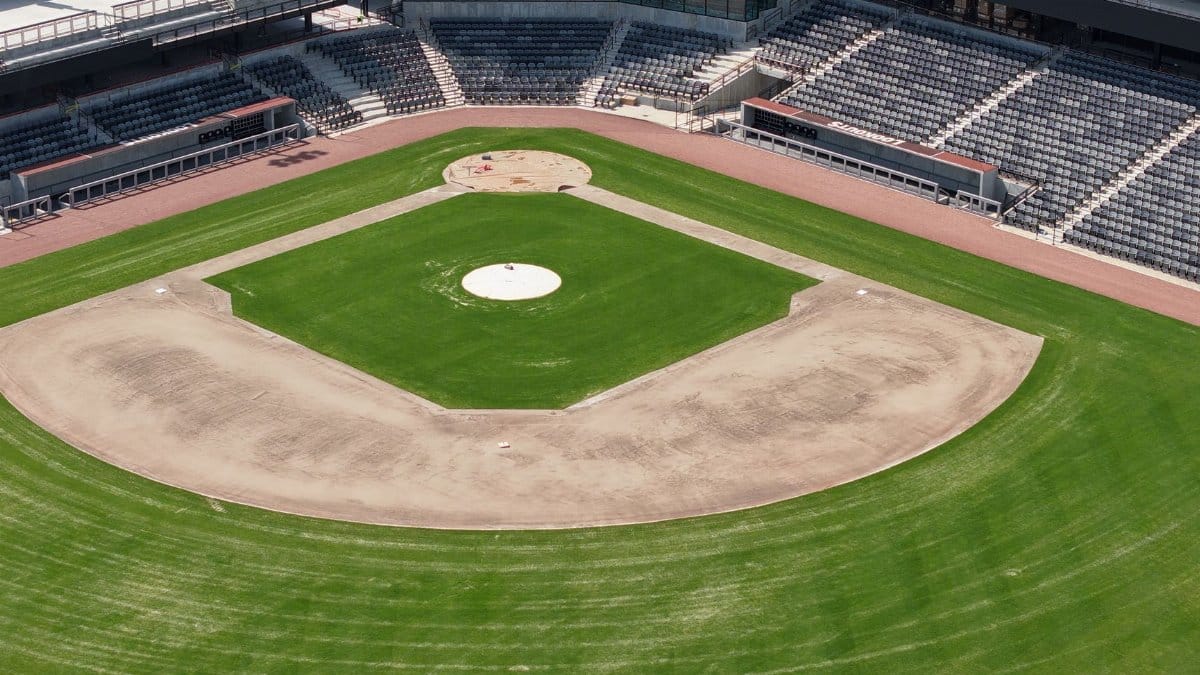 Aerial view of an empty baseball stadium in Chattanooga, Tennessee, showcasing the infield and seating.