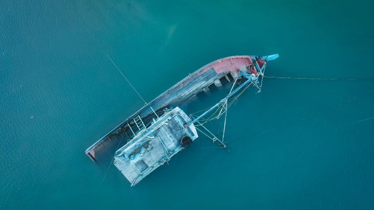 Drone shot of a sunken ship in Chukai, Terengganu's clear waters.