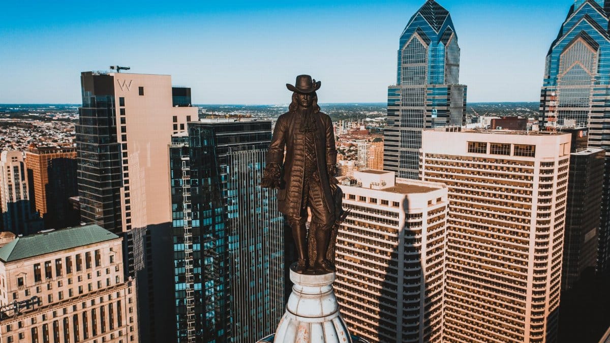 Drone view of monument of William Penn located on top of high tower in Philadelphia