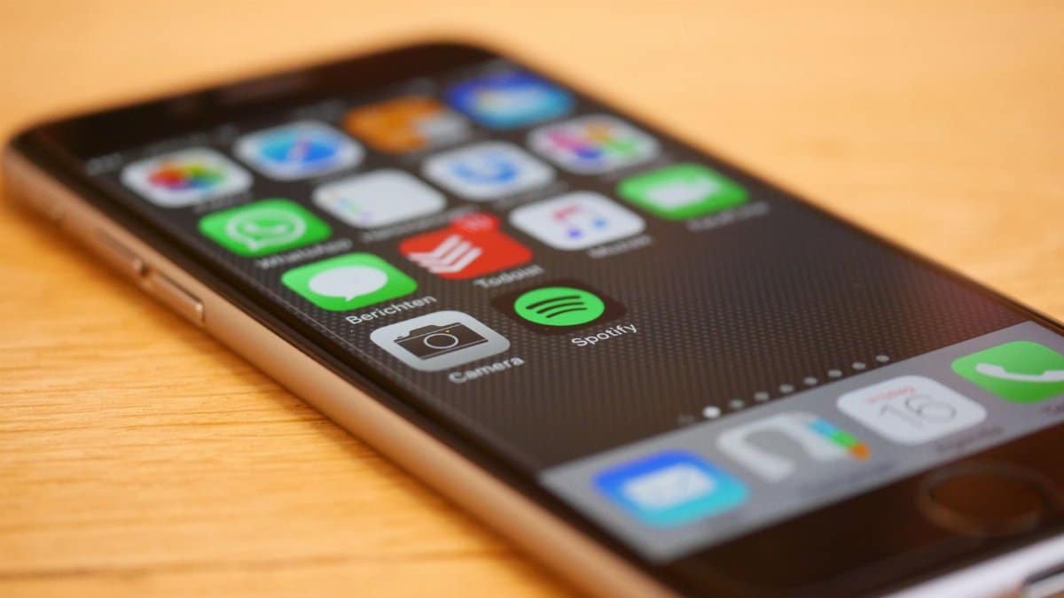 Close-up of a smartphone showcasing multiple app icons on its screen, representing modern technology and connectivity.