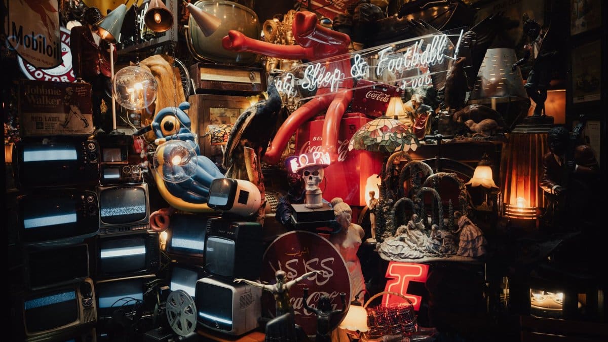 Explore a retro Istanbul thrift shop with vintage TVs and eclectic art displays.