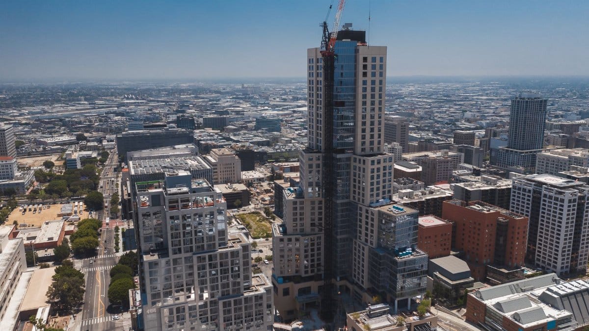 Vibrant aerial photo showcasing modern high-rise construction in Los Angeles cityscape.