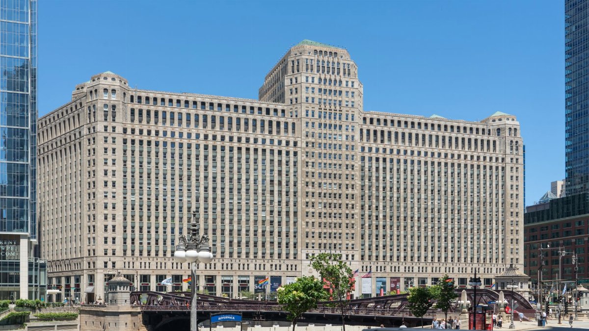 A daylight view of the iconic Merchandise Mart building in downtown Chicago, featuring its classic architecture.