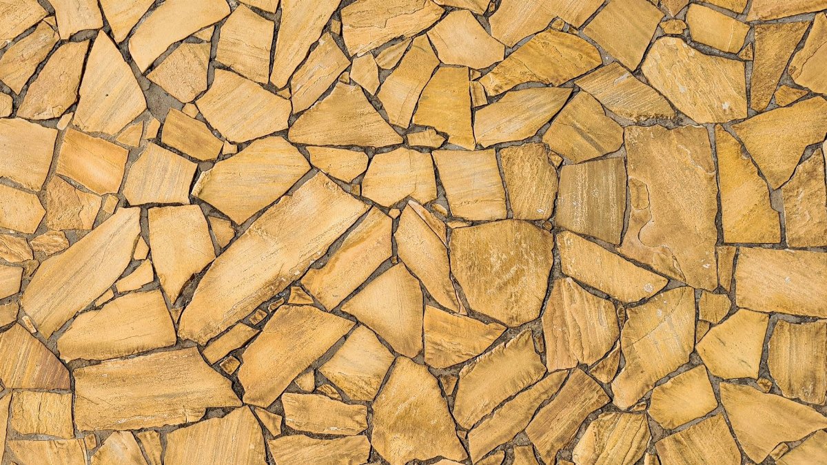 Top view of rustic stone pavement showcasing a natural and artistic pattern.