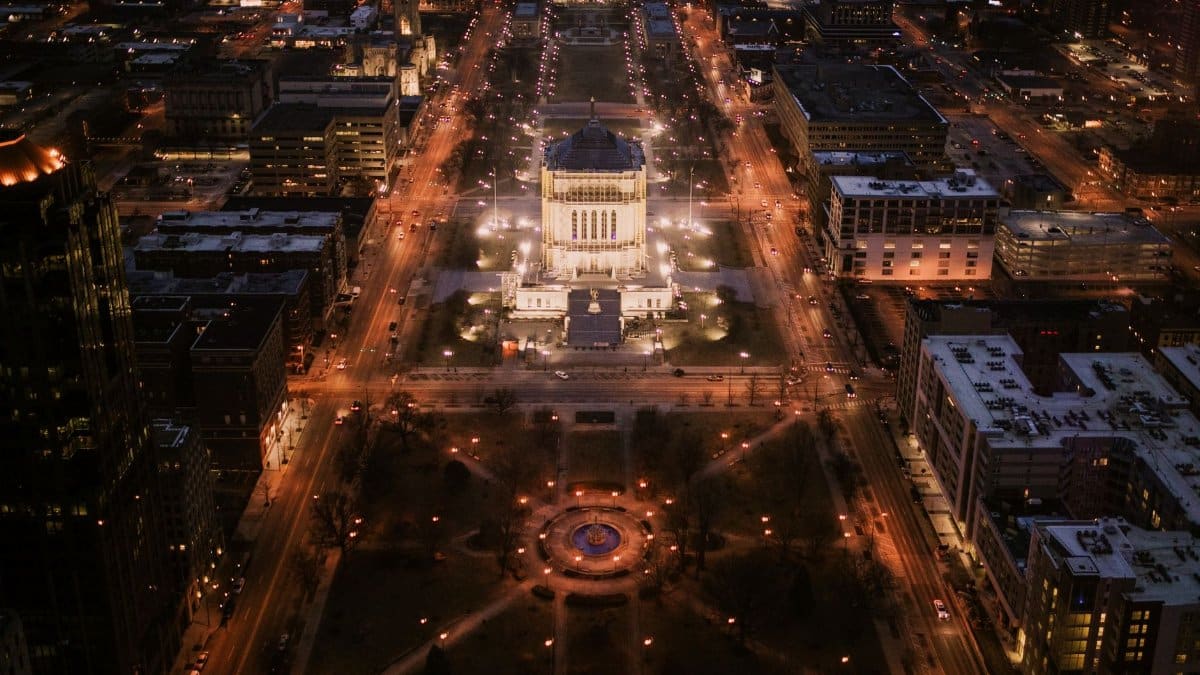 Breathtaking aerial night view of downtown Indianapolis featuring city lights and urban architecture.