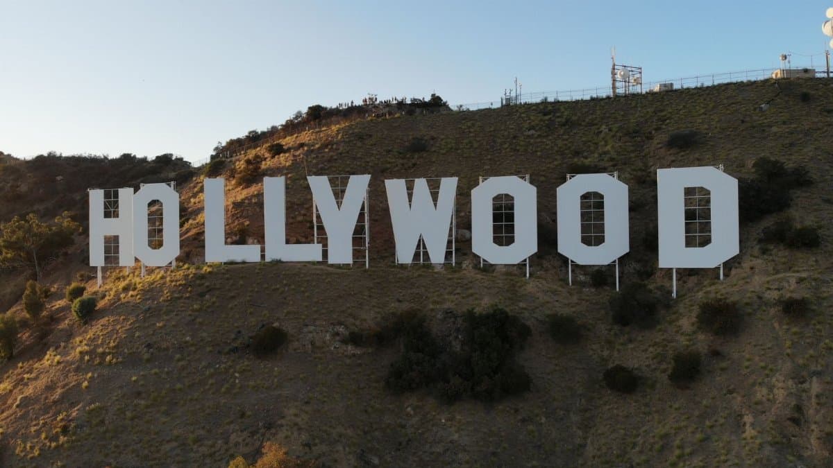 Sunlit view of the iconic Hollywood Sign on Mount Lee in Los Angeles, California.